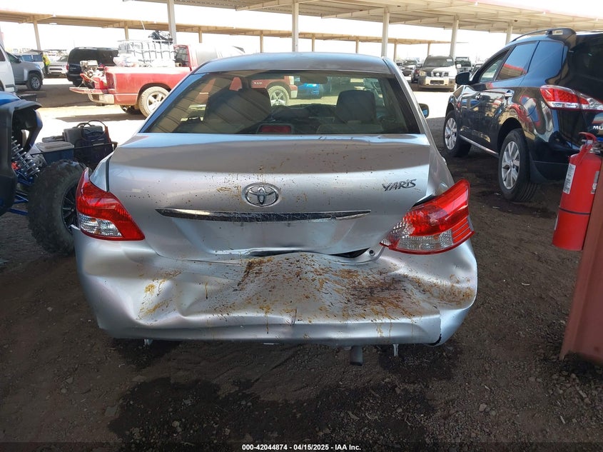 2012 Toyota Yaris VIN JTDBT4K39CL015100 IAAI salvage auction — REAR END, Salvage Title, sold $1,250 on 2026-07-21 (photo 6)