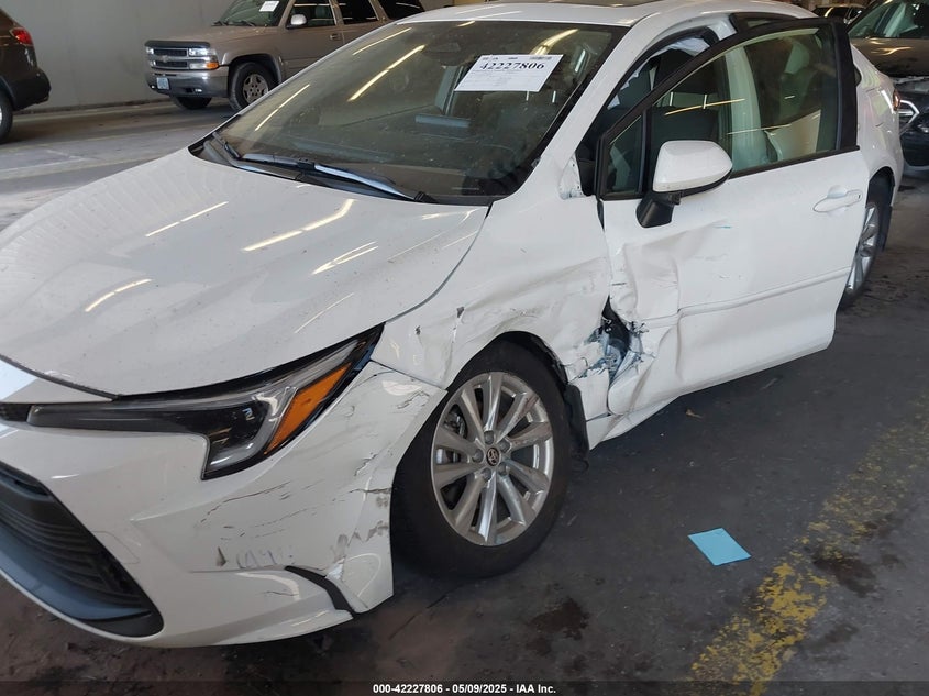 2024 Toyota Corolla VIN JTDBDMHE1RJ009804 IAAI salvage auction — RIGHT SIDE, Salvage (Oregon), sold $8,550 on 2026-07-09 (photo 6)