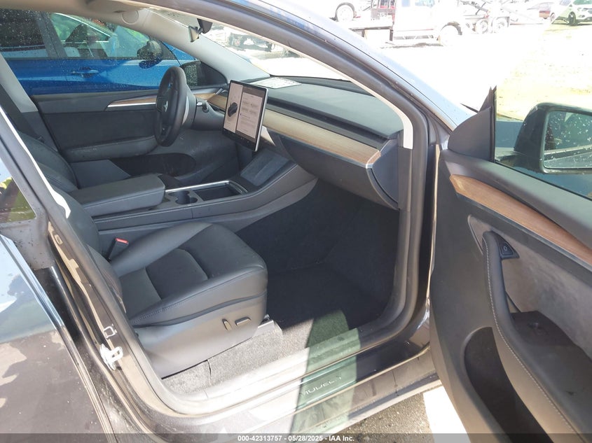 2024 Tesla Model Y VIN 7SAYGDED6RF054342 IAAI salvage auction — Side, Rebuildable (Florida), sold $14,500 on 2026-05-22 (photo 5)