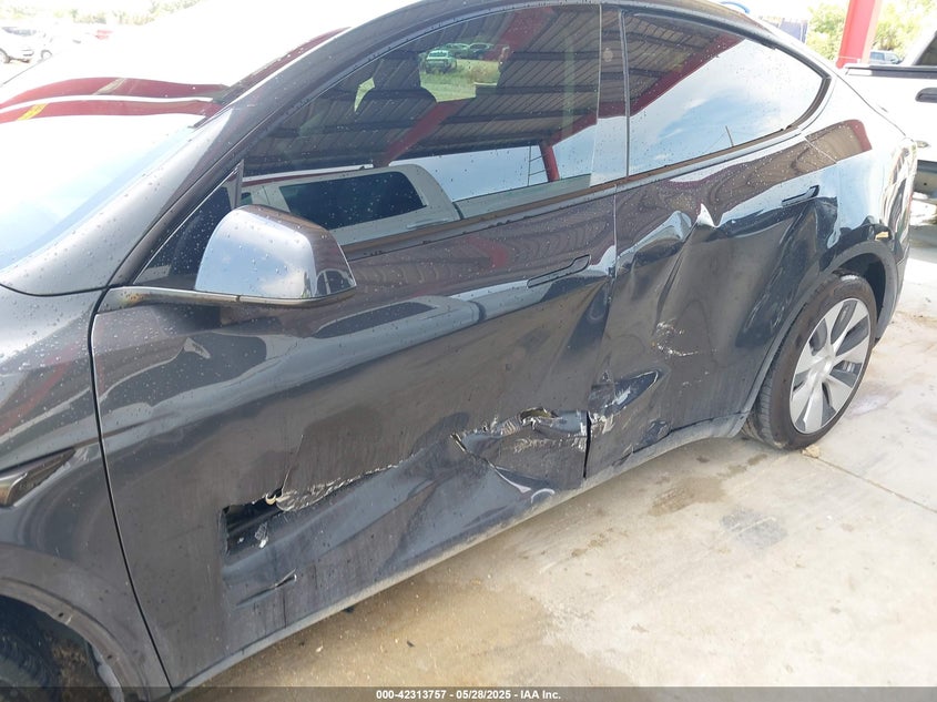 2024 Tesla Model Y VIN 7SAYGDED6RF054342 IAAI salvage auction — Side, Rebuildable (Florida), sold $14,500 on 2026-05-22 (photo 6)