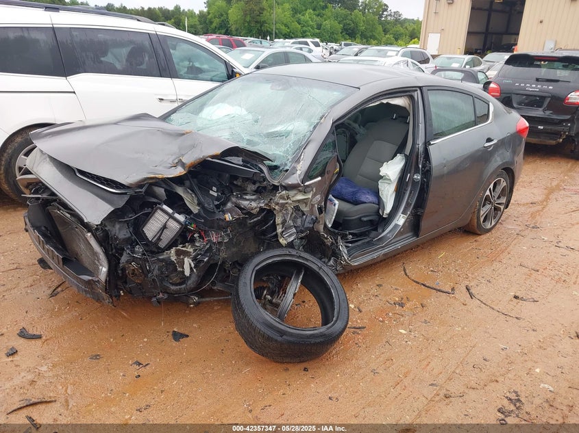 2014 Kia Forte VIN KNAFX4A80E5115335 IAAI salvage auction — FRONT & REAR, Salvage Title, sold $450 on 2026-07-20 (photo 2)
