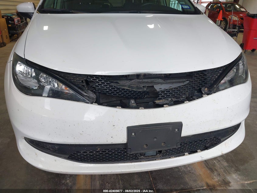 2023 Chrysler Voyager VIN 2C4RC1CG9PR533946 IAAI salvage auction — FRONT END, Enterprise Vehicles Clear Only (Texas), sold $12,200 on 2026-08-04 (photo 6)