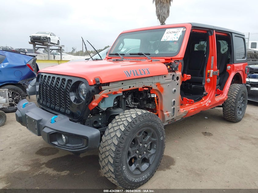 2023 Jeep Wrangler 4xe VIN 1C4JJXN60PW685289 IAAI salvage auction — SIDE, Salvage Title, sold $13,500 on 2026-09-07 (photo 2)