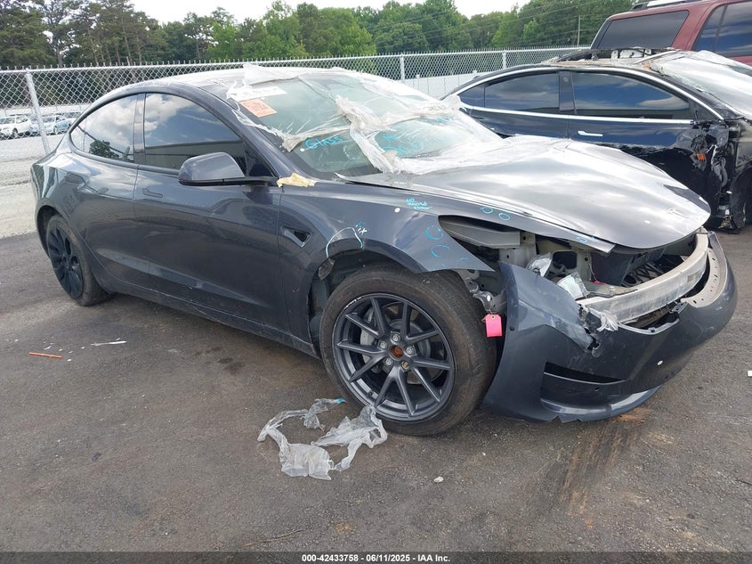 2022 Tesla Model 3 VIN 5YJ3E1EB5NF257856 IAAI salvage auction — FRONT END, Salvage Title, sold $14,450 on 2026-07-15 (photo 1)