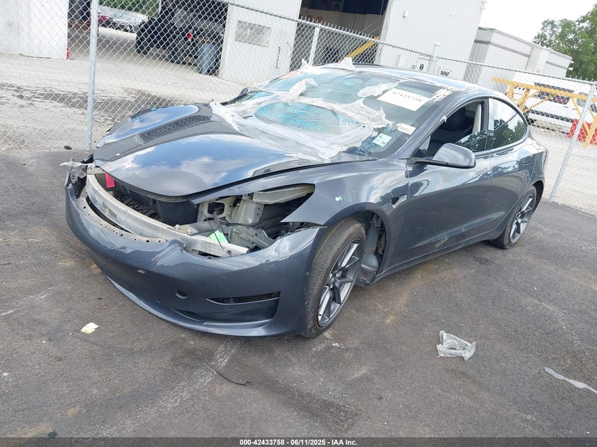 2022 Tesla Model 3 VIN 5YJ3E1EB5NF257856 IAAI salvage auction — FRONT END, Salvage Title, sold $14,450 on 2026-07-15 (photo 2)