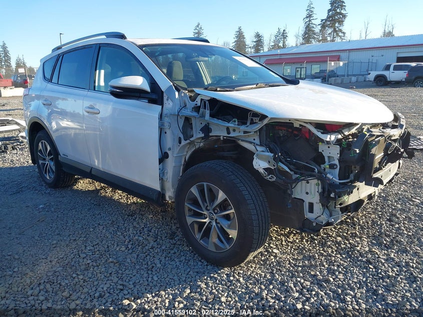 2018 TOYOTA RAV4 HV VIN JTMRJREV6JD194556 — COPART salvage auction photo