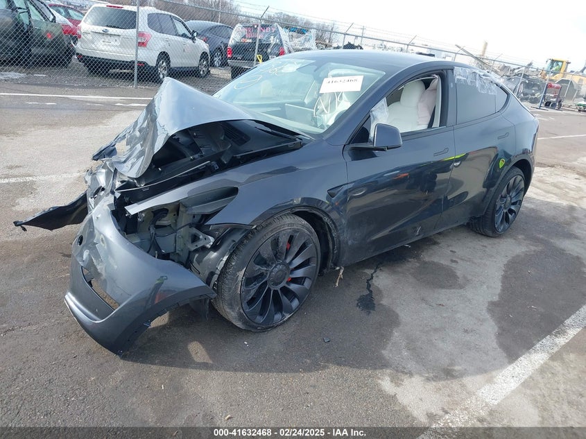 2024 Tesla Model y VIN 7SAYGDEF5RF039879 IAAI salvage auction — FRONT END, Salvage Title, sold $5,200 on 2026-07-28 (photo 2)
