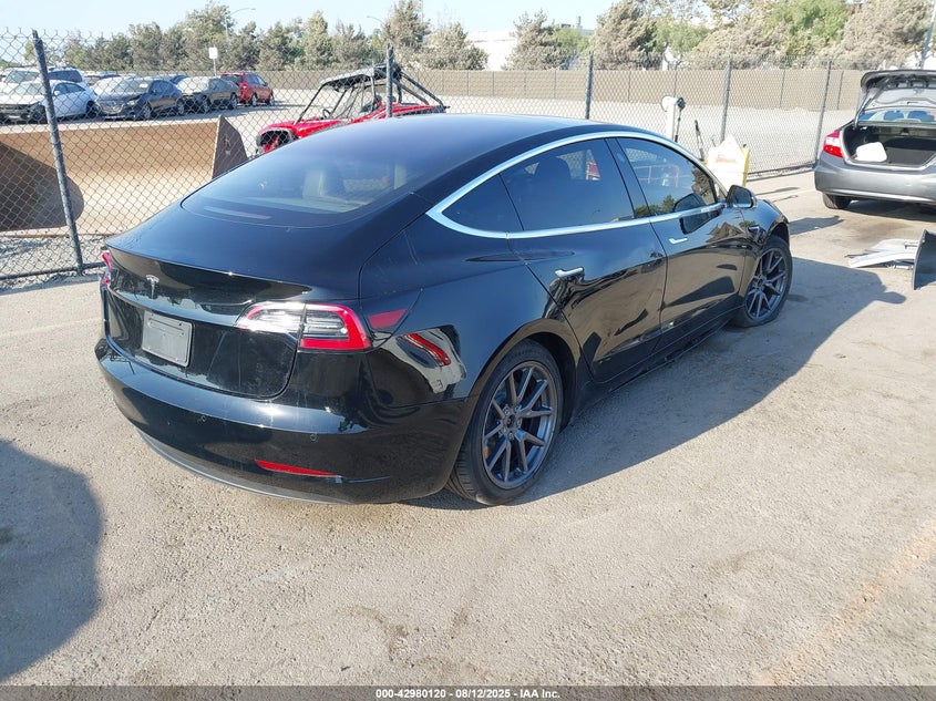 2018 Tesla Model 3 VIN 5YJ3E1EAXJF171914 IAAI salvage auction — LEFT SIDE, Salvage (California), sold $2,350 on 2026-07-06 (photo 4)