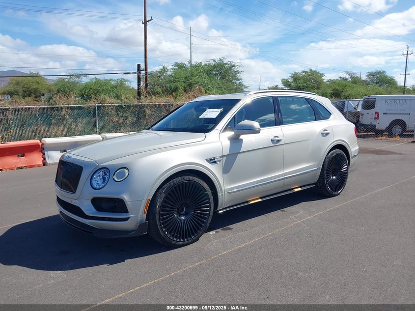 2018 Bentley Bentayga VIN SJAAC4ZVXJC019416 IAAI salvage auction — SUSPENSION, Salvage (Hawaii), sold $43,250 on 2026-08-25 (photo 2)