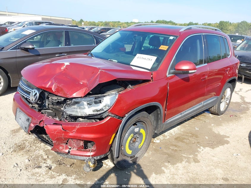 2014 Volkswagen Tiguan VIN WVGAV3AX5EW110934 IAAI salvage auction — LEFT FRONT, Salvage Title, sold $1,025 on 2026-07-07 (photo 2)