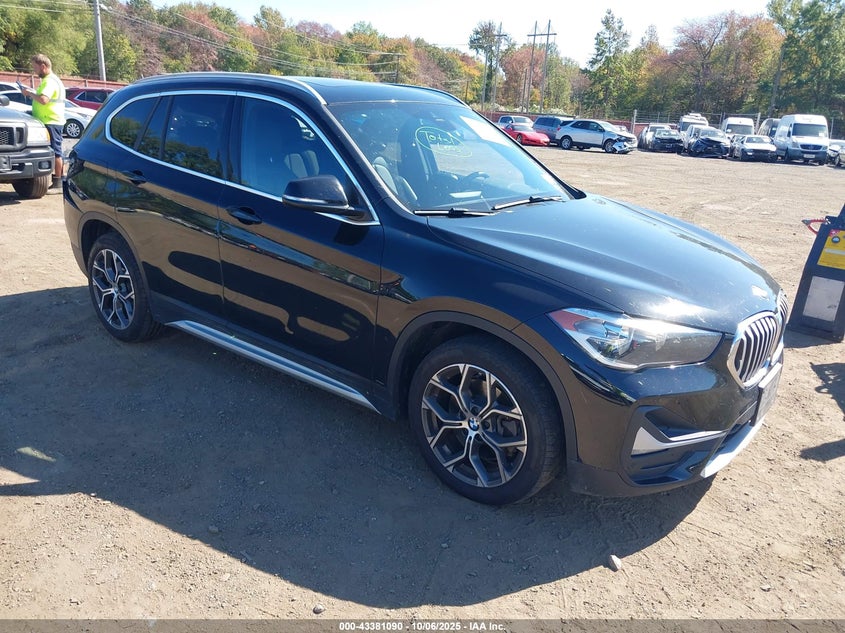 2020 BMW X1 VIN WBXJG9C09L5R33003 IAAI salvage auction — REAR END, Salvage Title, sold $9,275 on 2026-07-08 (photo 1)