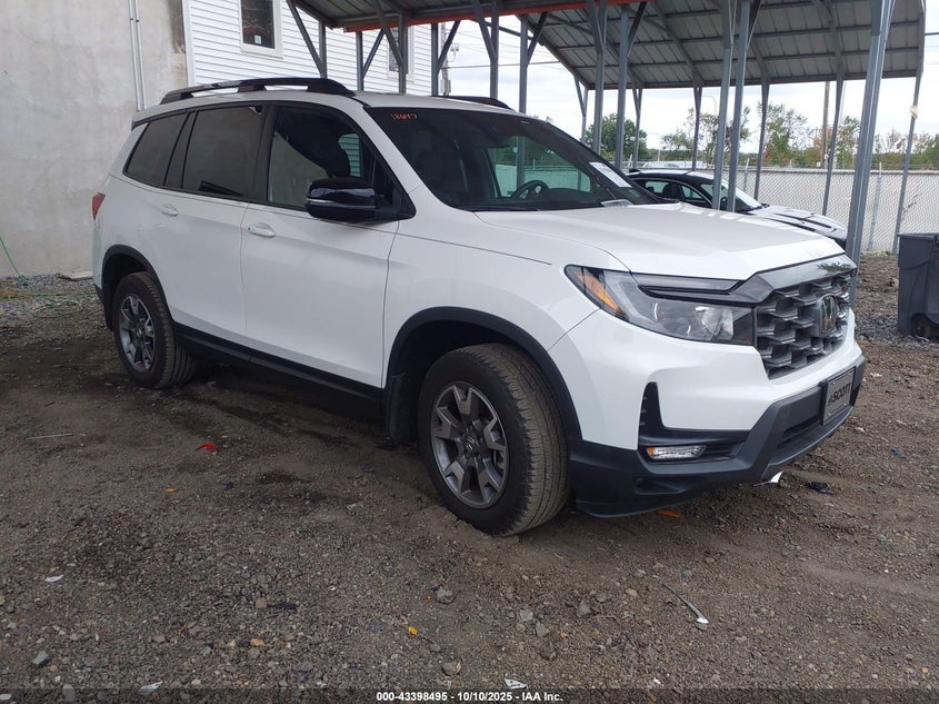 2023 Honda Passport VIN 5FNYF8H68PB043229 — IAAI salvage auction photo