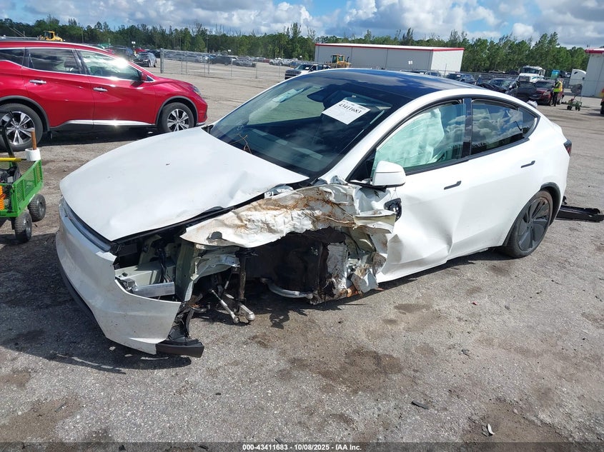 2026 Tesla Model y VIN 7SAYGDED0TA456796 IAAI salvage auction — SIDE, Certificate Of Destruction (Florida), sold $7,000 on 2026-07-16 (photo 2)
