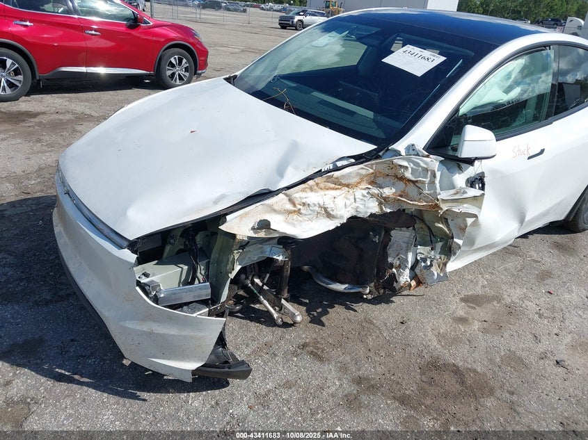 2026 Tesla Model y VIN 7SAYGDED0TA456796 IAAI salvage auction — SIDE, Certificate Of Destruction (Florida), sold $7,000 on 2026-07-16 (photo 6)