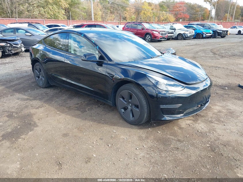2023 Tesla Model 3 VIN 5YJ3E1EA9PF577918 IAAI salvage auction — REAR END, Other, sold $7,900 on 2026-07-15 (photo 1)