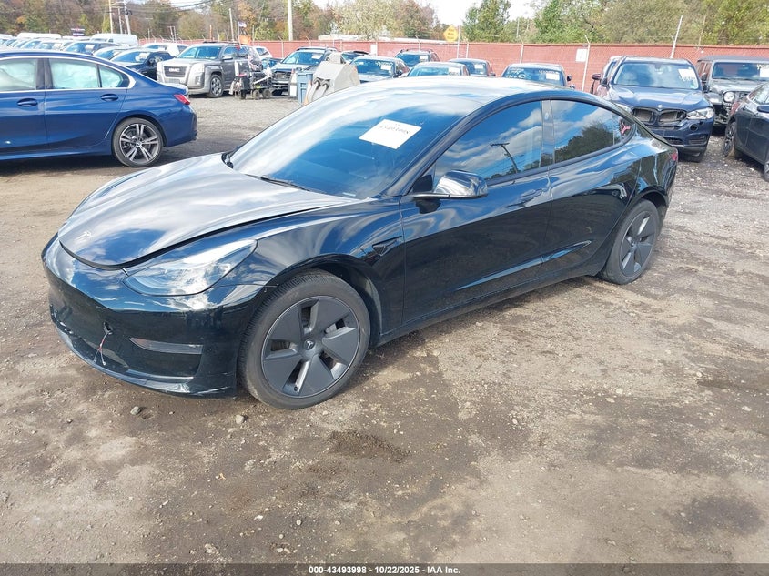 2023 Tesla Model 3 VIN 5YJ3E1EA9PF577918 IAAI salvage auction — REAR END, Other, sold $7,900 on 2026-07-15 (photo 2)