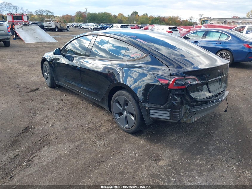 2023 Tesla Model 3 VIN 5YJ3E1EA9PF577918 IAAI salvage auction — REAR END, Other, sold $7,900 on 2026-07-15 (photo 3)