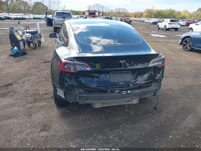2023 Tesla Model 3 VIN 5YJ3E1EA9PF577918 IAAI salvage auction — REAR END, Other, sold $7,900 on 2026-07-15 (photo 6)