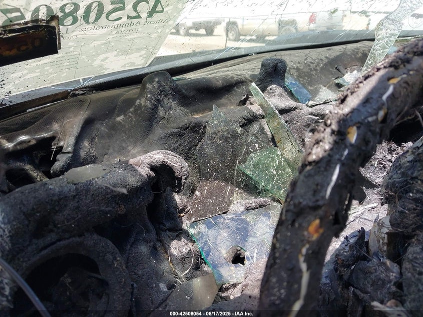 2022 Toyota Tacoma VIN 3TYRX5GN2NT049596 IAAI salvage auction — EXTERIOR BURN, Salvage Title, sold $2,750 on 2026-07-20 (photo 7)