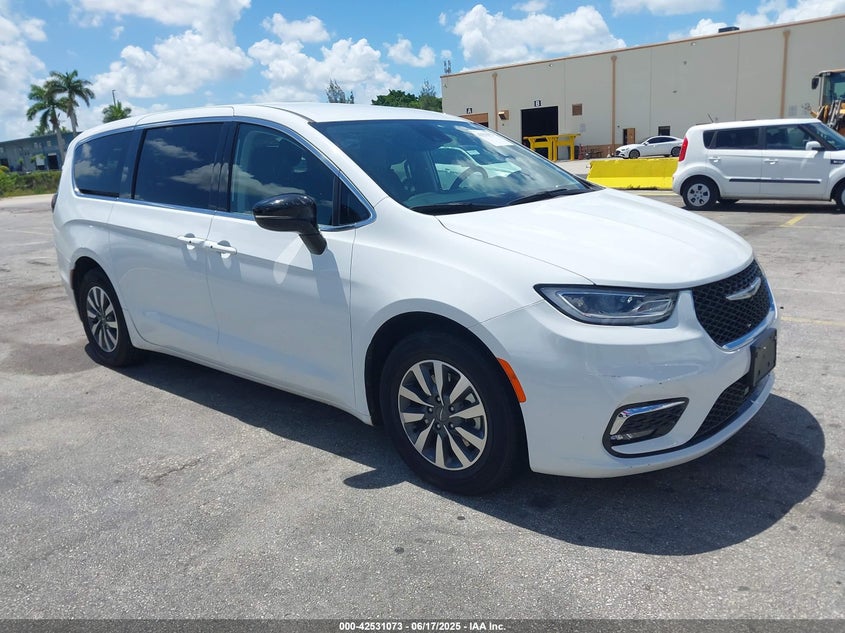 2024 Chrysler Pacifica hybrid VIN 2C4RC1S73RR121848 IAAI salvage auction — WATER/FLOOD, Salvage Title, sold $11,950 on 2026-07-16 (photo 1)