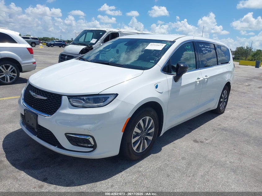 2024 Chrysler Pacifica hybrid VIN 2C4RC1S73RR121848 IAAI salvage auction — WATER/FLOOD, Salvage Title, sold $11,950 on 2026-07-16 (photo 2)