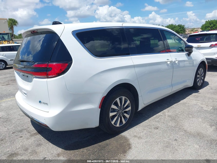 2024 Chrysler Pacifica hybrid VIN 2C4RC1S73RR121848 IAAI salvage auction — WATER/FLOOD, Salvage Title, sold $11,950 on 2026-07-16 (photo 4)
