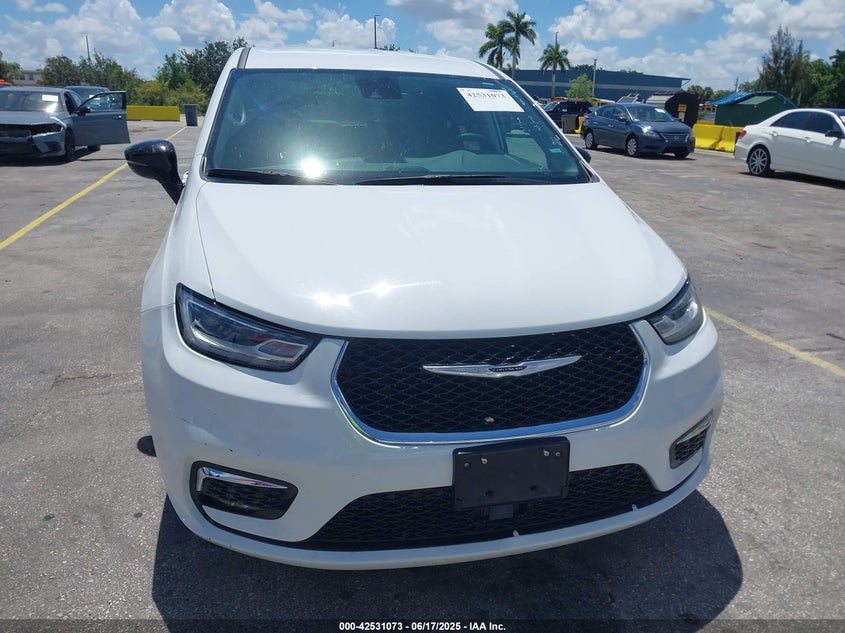 2024 Chrysler Pacifica hybrid VIN 2C4RC1S73RR121848 IAAI salvage auction — WATER/FLOOD, Salvage Title, sold $11,950 on 2026-07-16 (photo 6)