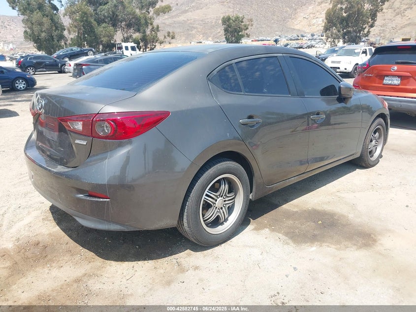 2014 Mazda Mazda3 VIN JM1BM1U70E1139945 IAAI salvage auction — INTERIOR BURN, Salvage Title, sold $900 on 2026-07-14 (photo 4)