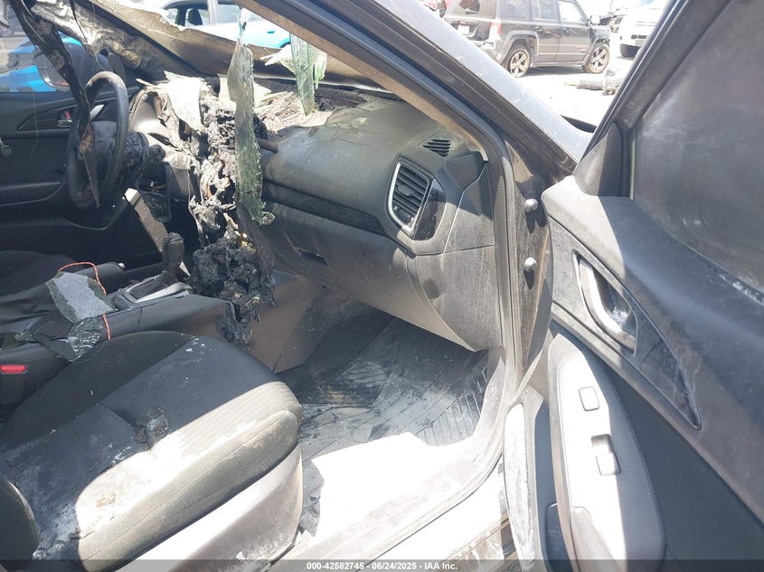 2014 Mazda Mazda3 VIN JM1BM1U70E1139945 IAAI salvage auction — INTERIOR BURN, Salvage Title, sold $900 on 2026-07-14 (photo 5)