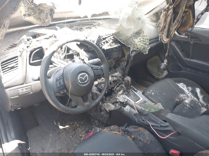 2014 Mazda Mazda3 VIN JM1BM1U70E1139945 IAAI salvage auction — INTERIOR BURN, Salvage Title, sold $900 on 2026-07-14 (photo 6)