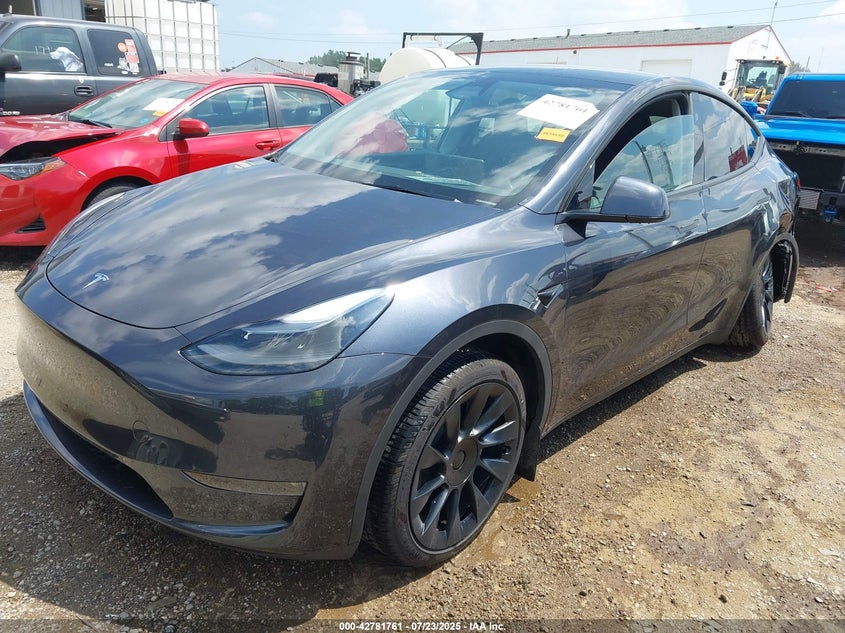 2024 Tesla Model y VIN 7SAYGDEE2RA273241 IAAI salvage auction — LEFT & RIGHT, Salvage (Illinois), sold $11,800 on 2026-07-08 (photo 2)