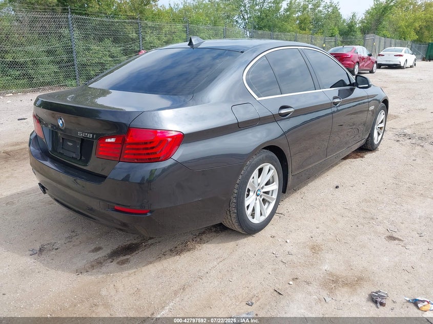 2015 BMW 5 series VIN WBA5A5C54FD514990 IAAI salvage auction — NORMAL WEAR, Salvage Title, sold $2,375 on 2026-10-12 (photo 4)