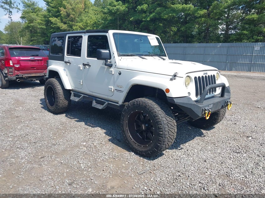 2015 Jeep Wrangler unlimited VIN 1C4BJWEG9FL604166 IAAI salvage auction — LEFT SIDE, Salvage Title, sold $7,000 on 2026-07-29 (photo 1)