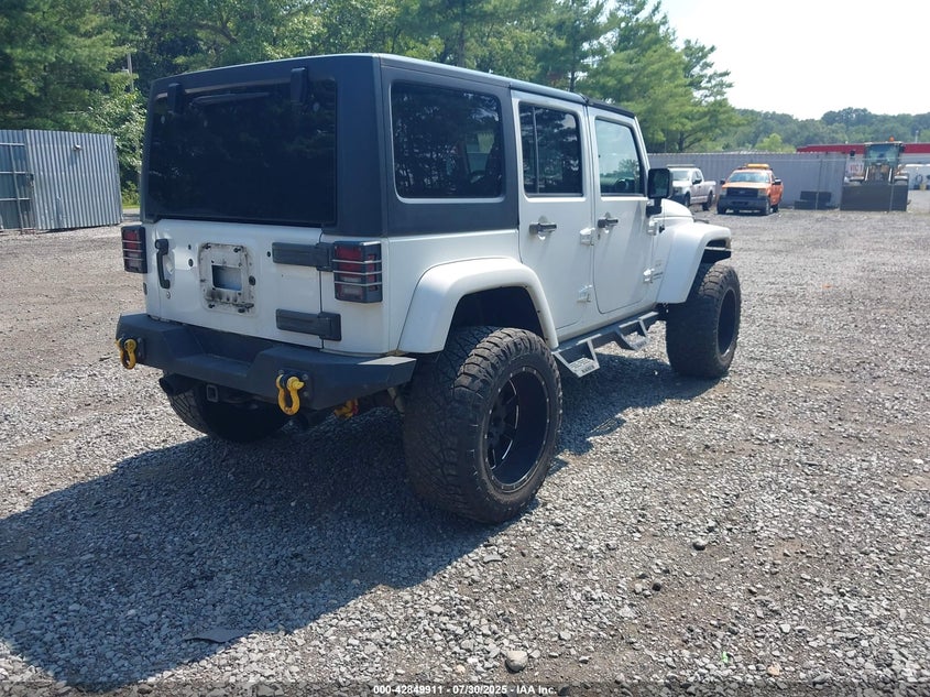 2015 Jeep Wrangler unlimited VIN 1C4BJWEG9FL604166 IAAI salvage auction — LEFT SIDE, Salvage Title, sold $7,000 on 2026-07-29 (photo 4)