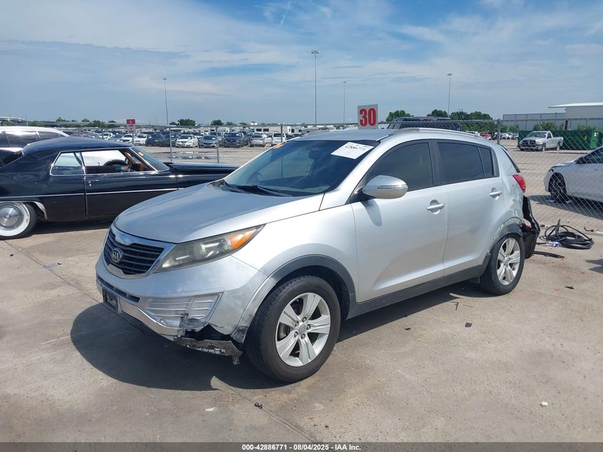 2011 Kia Sportage VIN KNDPB3A2XB7018719 IAAI salvage auction — FRONT & REAR, Salvage (Texas), sold $675 on 2026-07-08 (photo 2)