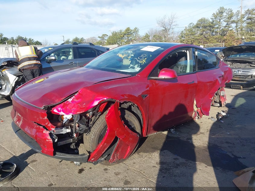 2026 Tesla Model y VIN 7SAYGDEE6TA380106 IAAI salvage auction — FRONT & REAR, Mv-907A (New York), sold $9,775 on 2026-07-28 (photo 2)