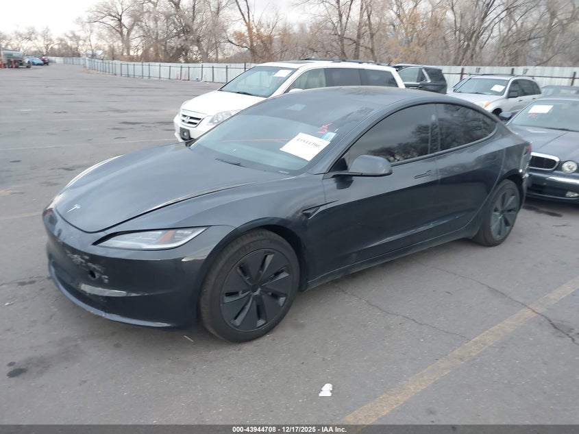 2025 Tesla Model 3 VIN 5YJ3E1EA8SF872243 IAAI salvage auction — FRONT & REAR, Salvage Title, sold $17,100 on 2026-07-09 (photo 2)