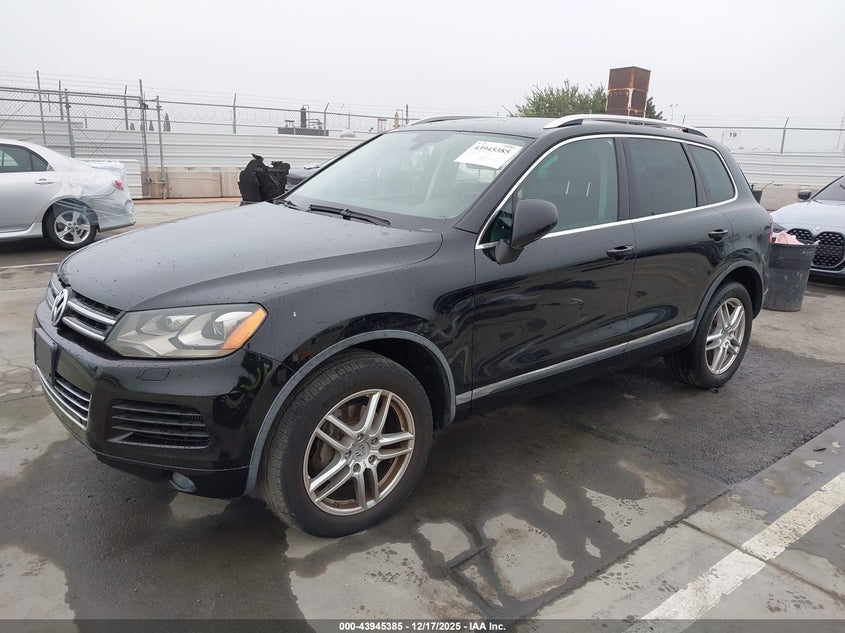 2014 Volkswagen Touareg VIN WVGEP9BP1ED000858 IAAI salvage auction — RIGHT SIDE, Other, sold $825 on 2026-07-22 (photo 2)