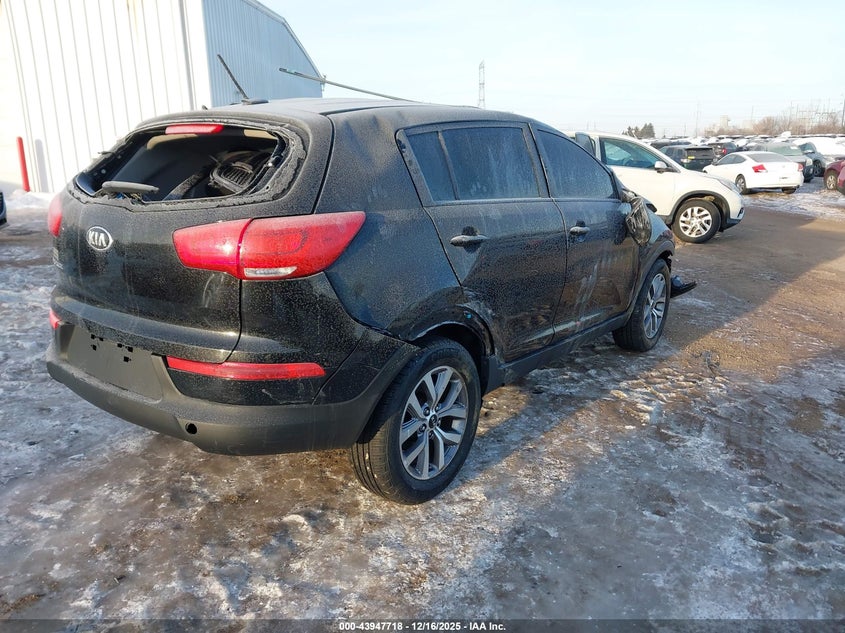2015 Kia Sportage VIN KNDPBCAC8F7786987 IAAI salvage auction — ROLLOVER, Salvage Title, sold $275 on 2026-07-22 (photo 4)