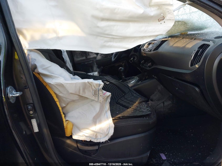 2015 Kia Sportage VIN KNDPBCAC8F7786987 IAAI salvage auction — ROLLOVER, Salvage Title, sold $275 on 2026-07-22 (photo 5)
