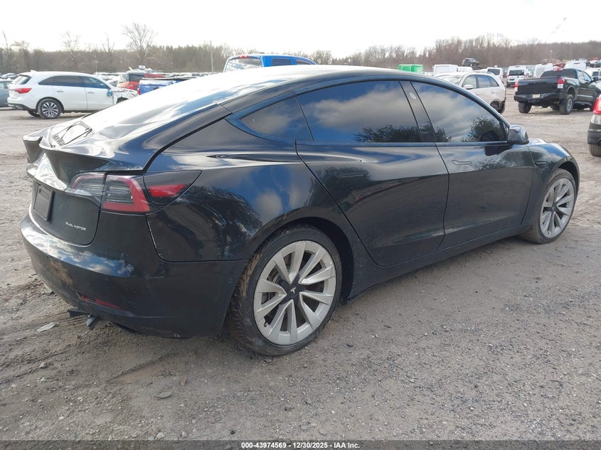 2022 Tesla Model 3 VIN 5YJ3E1EB4NF189811 IAAI salvage auction — REAR END, Other, sold $5,600 on 2026-07-18 (photo 4)