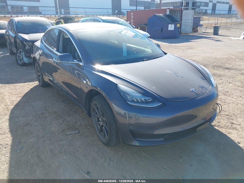 2019 Tesla Model 3 VIN 5YJ3E1EA8KF308141 IAAI salvage auction — Unknown, Original (Texas), sold $5,450 on 2026-03-12 (photo 1)