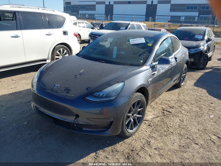2019 Tesla Model 3 VIN 5YJ3E1EA8KF308141 IAAI salvage auction — Unknown, Original (Texas), sold $5,450 on 2026-03-12 (photo 2)