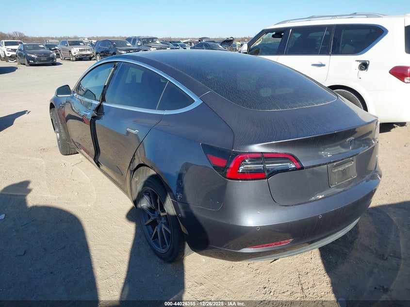 2019 Tesla Model 3 VIN 5YJ3E1EA8KF308141 IAAI salvage auction — Unknown, Original (Texas), sold $5,450 on 2026-03-12 (photo 3)