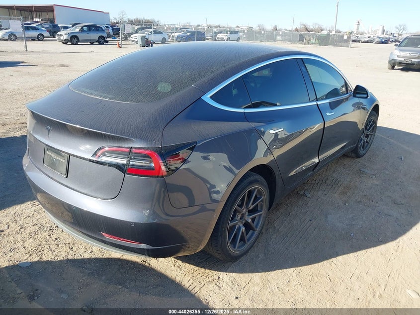 2019 Tesla Model 3 VIN 5YJ3E1EA8KF308141 IAAI salvage auction — Unknown, Original (Texas), sold $5,450 on 2026-03-12 (photo 4)