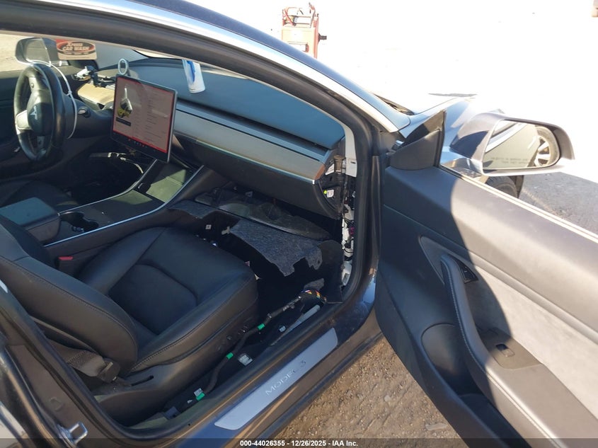 2019 Tesla Model 3 VIN 5YJ3E1EA8KF308141 IAAI salvage auction — Unknown, Original (Texas), sold $5,450 on 2026-03-12 (photo 5)