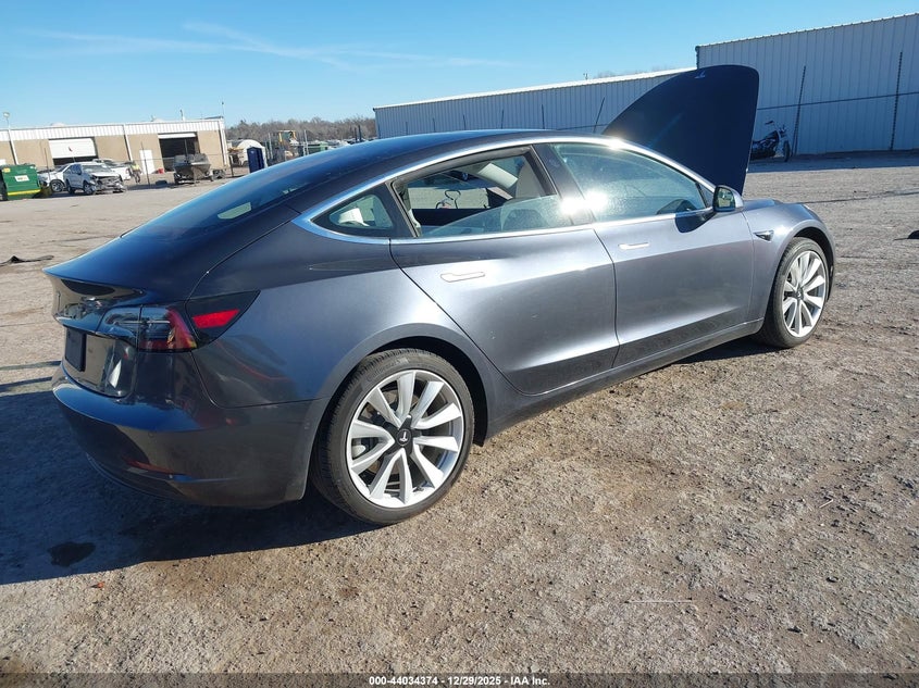 2019 Tesla Model 3 VIN 5YJ3E1EA8KF345450 IAAI salvage auction — LEFT SIDE, Clear (Oklahoma), sold $6,300 on 2026-07-15 (photo 4)