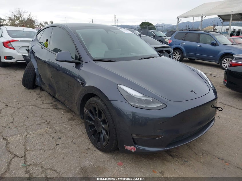 2023 Tesla Model y VIN 7SAYGDEE9PF960362 IAAI salvage auction — RIGHT SIDE, Salvage (California), sold $12,450 on 2026-09-03 (photo 1)