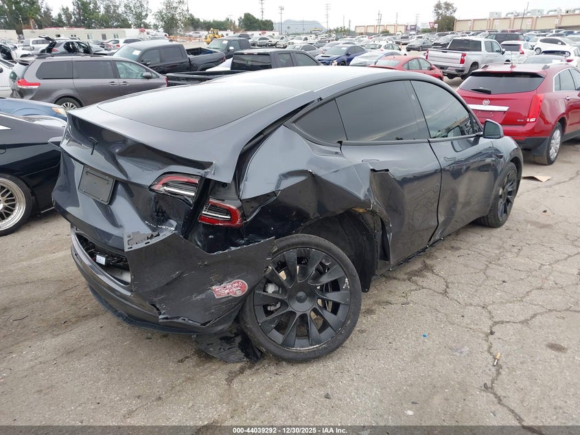 2023 Tesla Model y VIN 7SAYGDEE9PF960362 IAAI salvage auction — RIGHT SIDE, Salvage (California), sold $12,450 on 2026-09-03 (photo 4)
