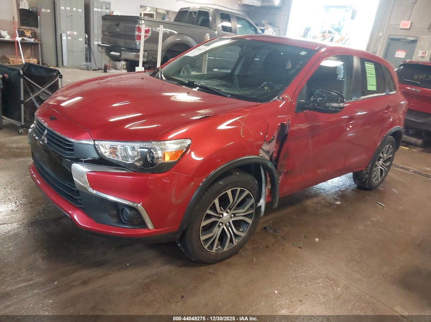 2016 Mitsubishi Outlander VIN JA4AP3AU1GZ065202 IAAI salvage auction — SIDE, Clear (Wisconsin), sold $525 on 2026-07-28 (photo 2)